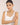 Woman wearing a white sleeveless top with white beads bracelet against a plain background