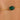 Gold bracelet with a green gemstone on a person's wrist