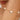 Gold bracelet with pearls on a wrist
