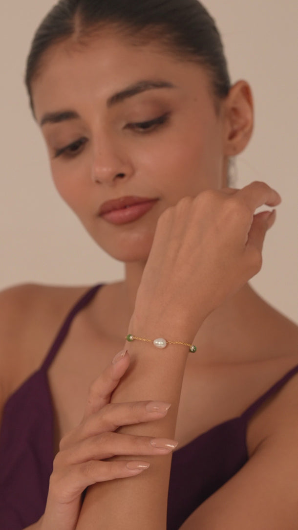 Woman wearing a bracelet in her hand